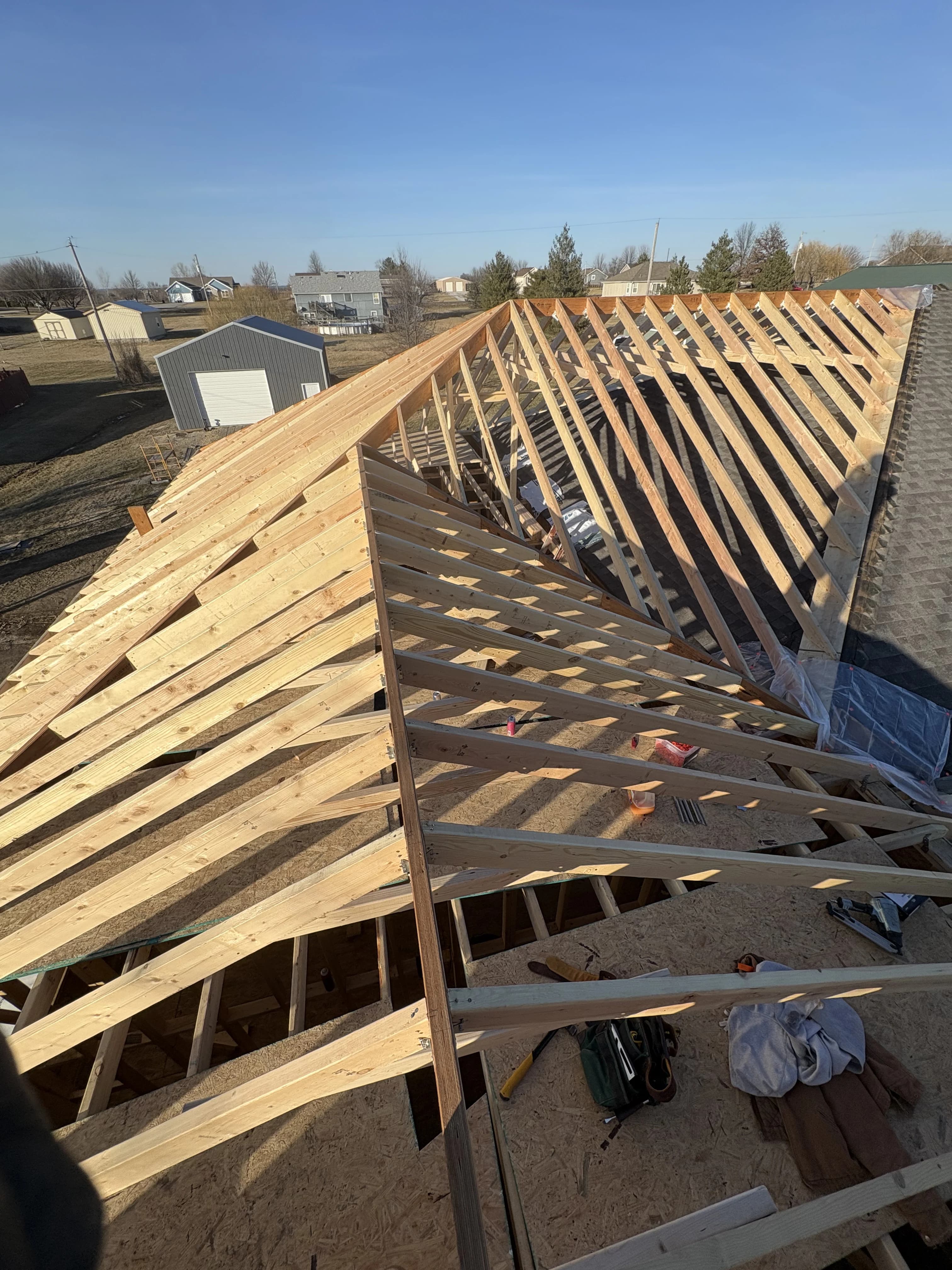 On-site framing progress and structural carpentry details.